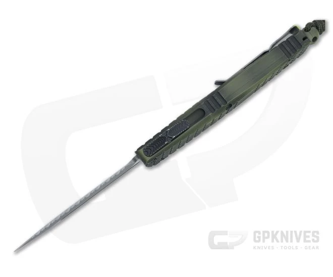 Microtech Combat Troodon D/E Frag Off Apocalyptic Double Reverse Full Serrated Green OTF Automatic Knife 142-DR12APFOGG 3 Microtech Combat Troodon D/E Frag Off Apocalyptic Double Reverse Full Serrated Green OTF Automatic Knife 142-DR12APFOGG - Image 3